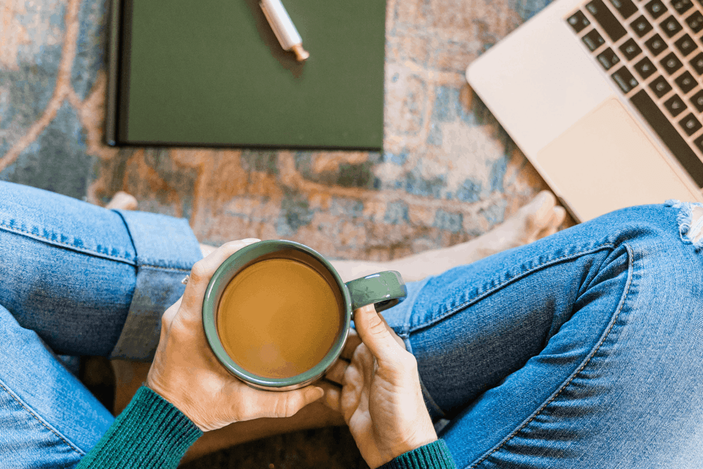 Girl enjoys work-life balance with coffee